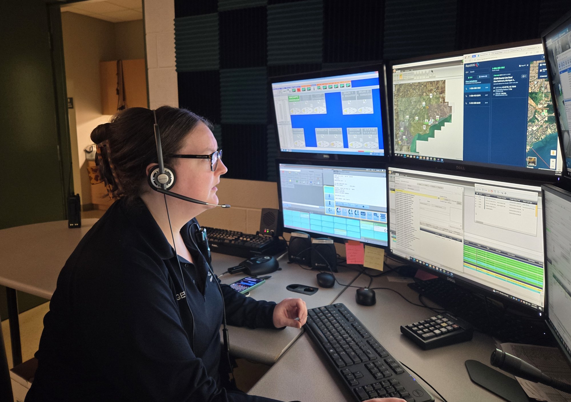 A Chesterfield Township dispatcher at the Communication Center console